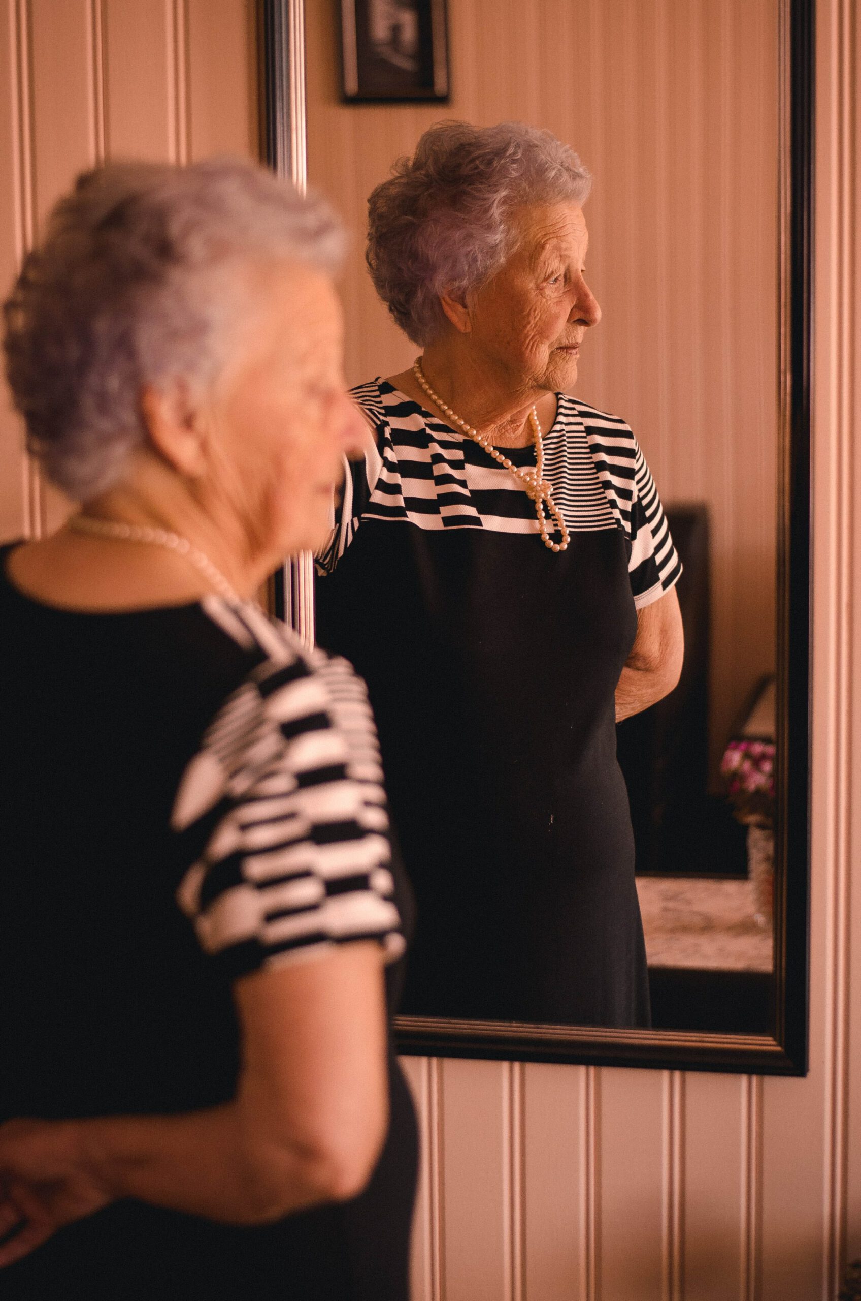 Photo Of Woman Standing In Front Of Mirror 2269726 Association 