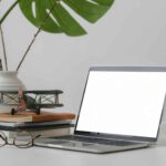macbook-pro-on-white-table-3816195